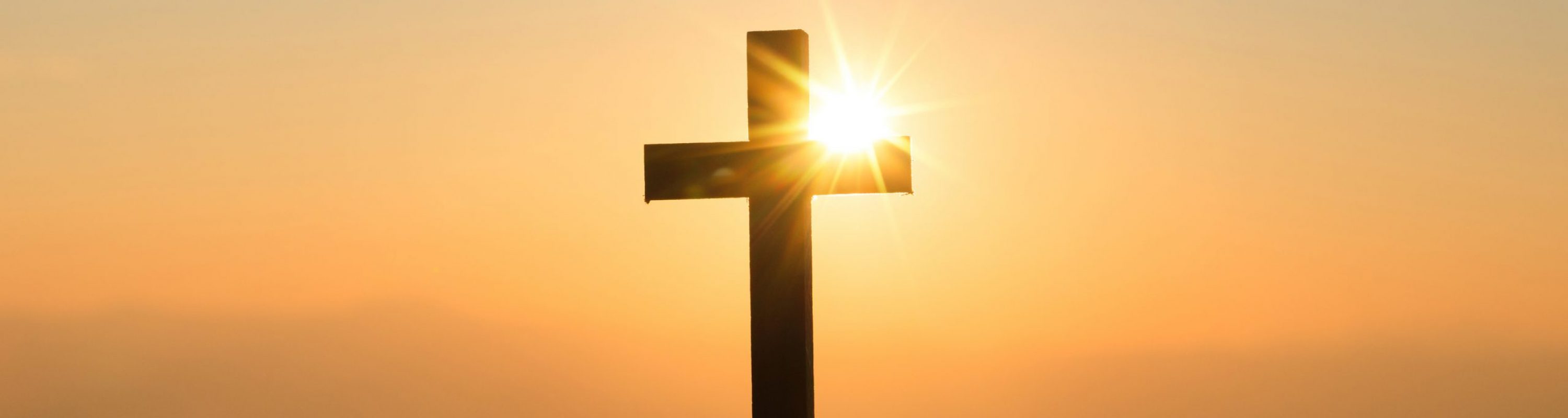 Resurrection concept:Crucifixion Of Jesus Christ Cross At Sunset